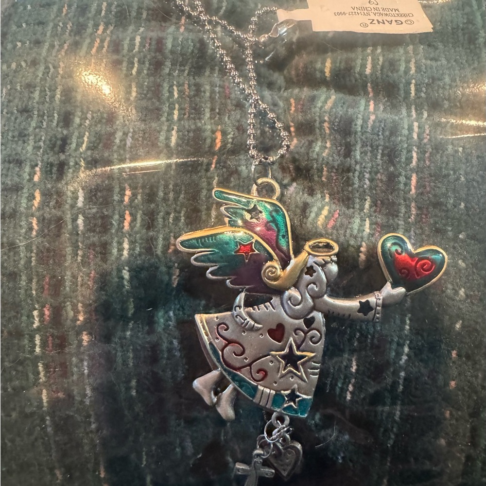 Cute metal angel to hang from  rearview mirror NWT